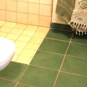 Håndlavet hulkehl flise fra Villa Flisers patenterede kollektion – nordisk design i marmor-cement