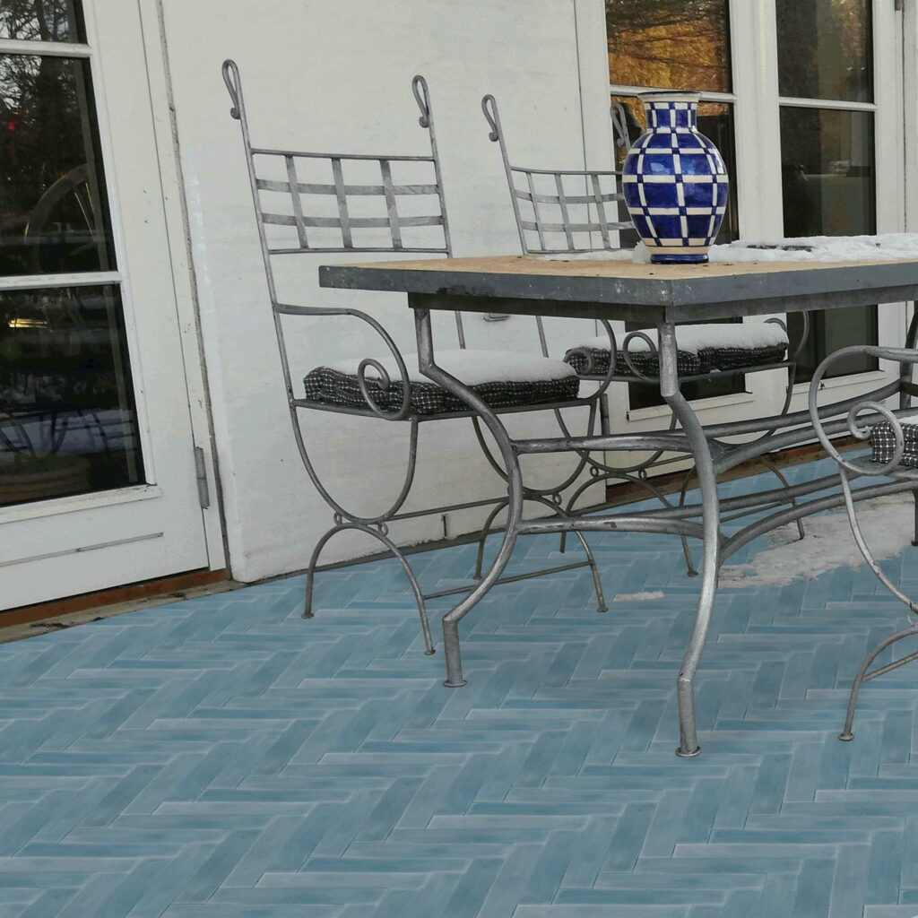 Håndlavet cementflise i moderne stil, der tilfører tidløs elegance til ude eller inde. En sildebensflise i nordiske farver 